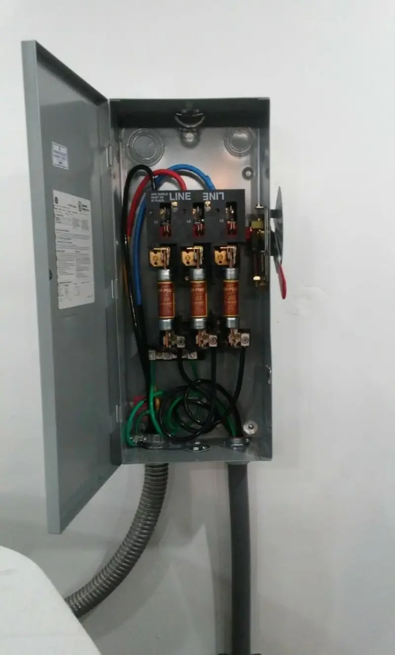 Three-phase disconnect switch installed for Smoke Detector Installation in Decatur